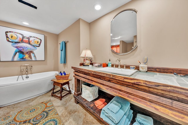 bathroom with sink and a bathtub