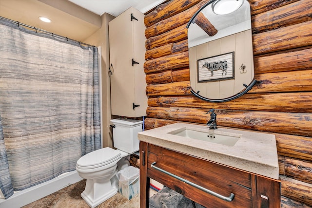 bathroom featuring vanity, log walls, curtained shower, and toilet