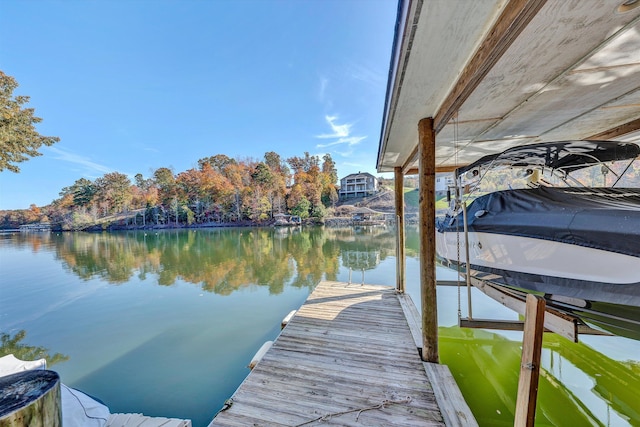 view of dock with a water view