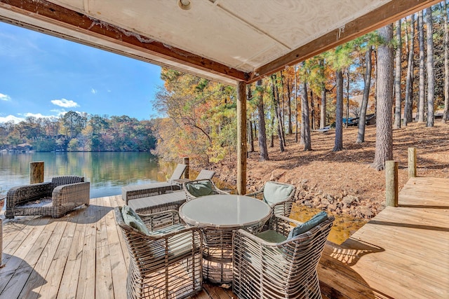 wooden terrace with a water view