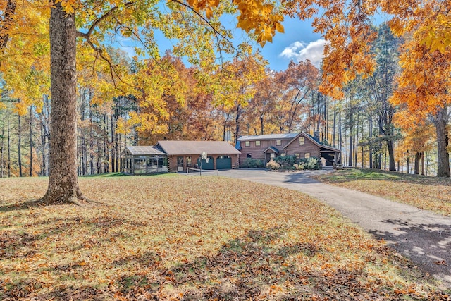 single story home with a garage