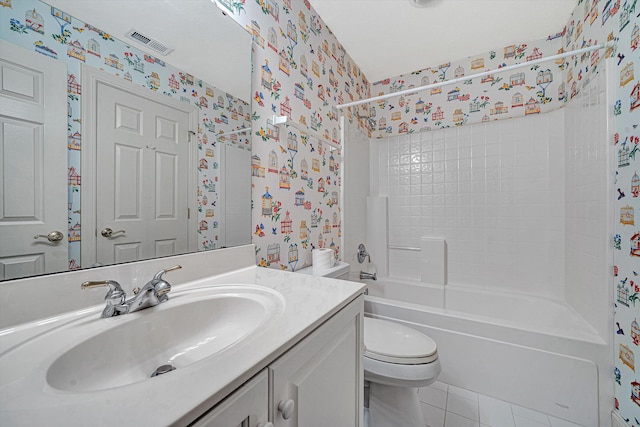 full bathroom with shower / bathing tub combination, vanity, tile patterned floors, and toilet