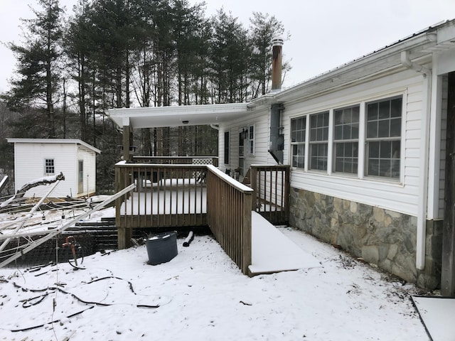 view of snow covered deck