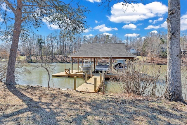 dock area featuring a water view and boat lift