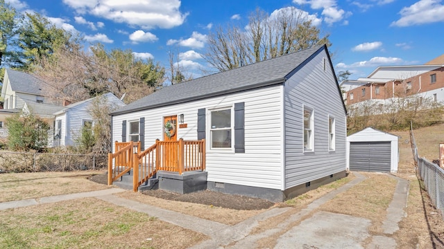 view of front of property with an outdoor structure