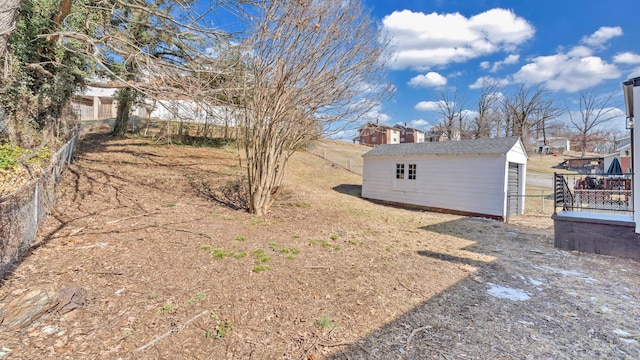 view of yard with a storage unit