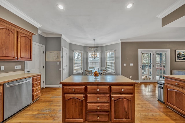 kitchen featuring dishwasher, baseboards, light wood-style floors, and brown cabinets