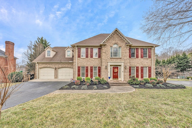 view of front of property featuring an attached garage, brick siding, driveway, roof with shingles, and a front lawn