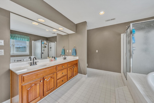 full bath featuring a sink, double vanity, visible vents, and a shower stall