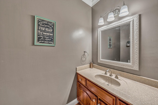 bathroom featuring vanity and crown molding