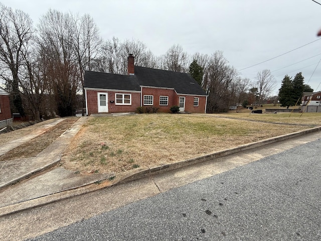 ranch-style house with a front yard