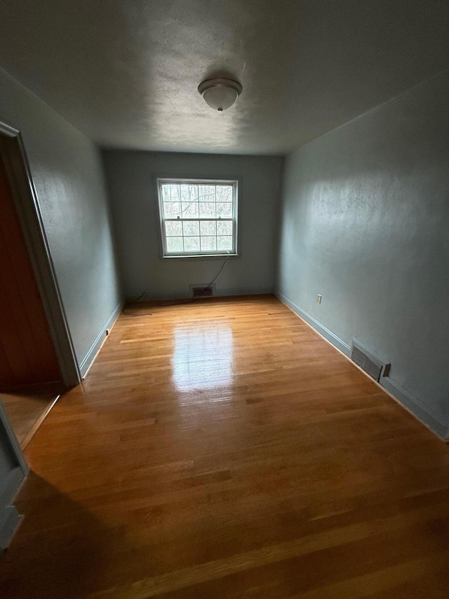 45 Hillcrest Dr, Rocky Mount, VA 24151 - unfurnished bedroom with baseboards, light wood-style flooring, and visible vents
