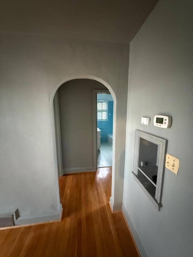 45 Hillcrest Dr, Rocky Mount, VA 24151 - corridor featuring arched walkways, baseboards, and wood finished floors