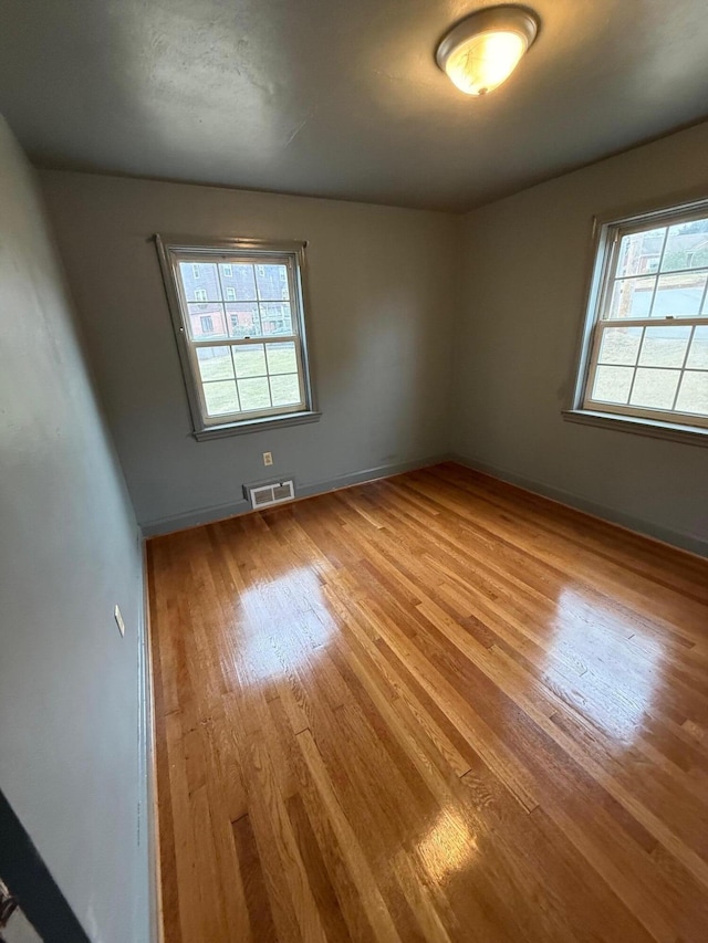 45 Hillcrest Dr, Rocky Mount, VA 24151 - spare room with wood finished floors, baseboards, and visible vents