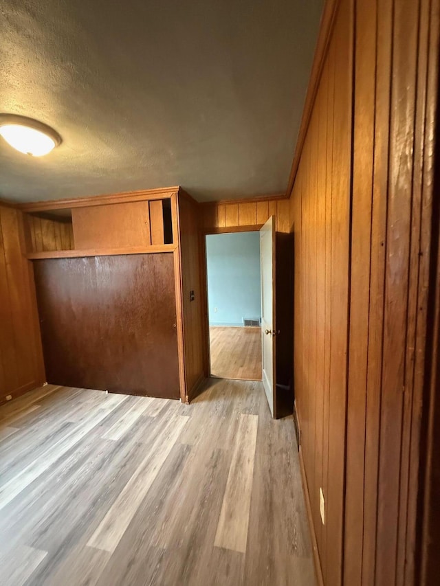 45 Hillcrest Dr, Rocky Mount, VA 24151 - interior space with light wood-style flooring and wooden walls