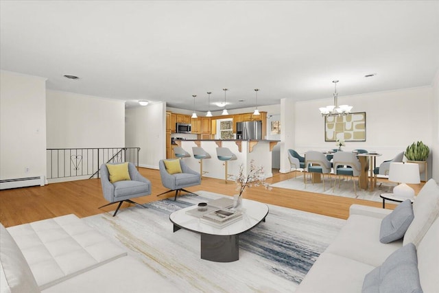 1909 Pelham Dr, Roanoke, VA 24018 - living area with a chandelier, light wood finished floors, and visible vents