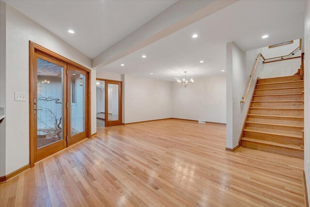 3615 Dogwood Ln SW, Roanoke, VA 24015 - foyer entrance with light wood finished floors, baseboards, stairs, recessed lighting, and a chandelier