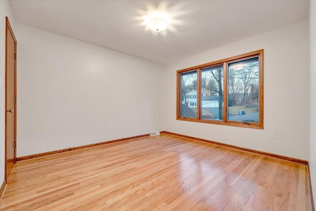 3615 Dogwood Ln SW, Roanoke, VA 24015 - spare room with light wood-style flooring and baseboards