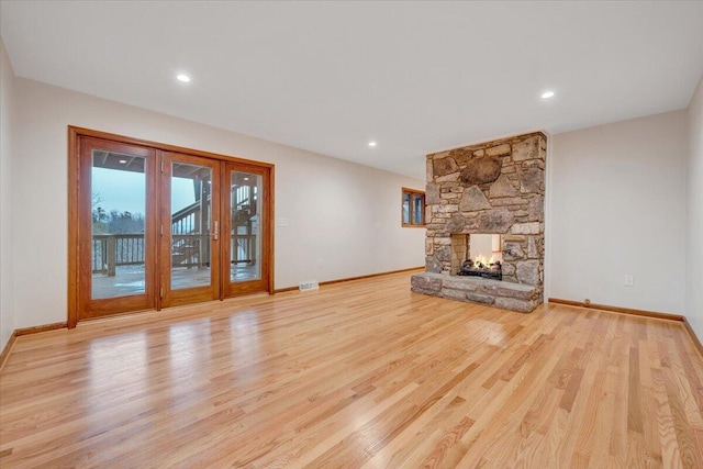 3615 Dogwood Ln SW, Roanoke, VA 24015 - unfurnished living room with baseboards, wood finished floors, a fireplace, and recessed lighting