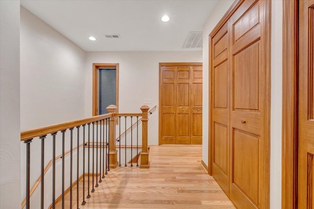 3615 Dogwood Ln SW, Roanoke, VA 24015 - hall with an upstairs landing, light wood finished floors, and recessed lighting