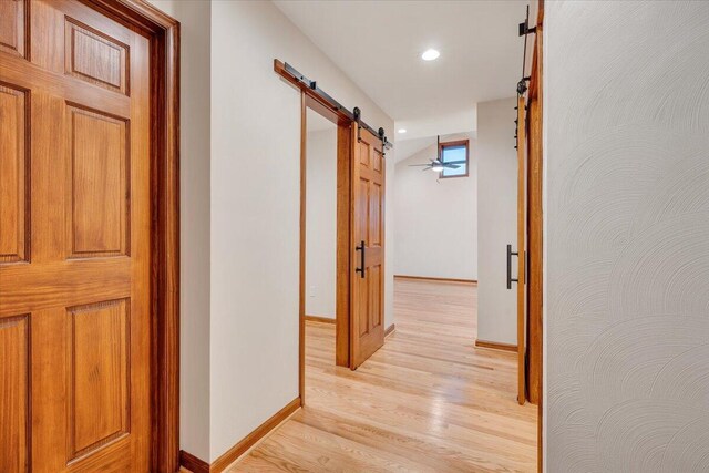 3615 Dogwood Ln SW, Roanoke, VA 24015 - corridor with a barn door, baseboards, light wood-style floors, and recessed lighting