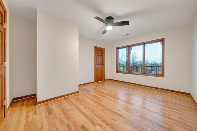 3615 Dogwood Ln SW, Roanoke, VA 24015 - empty room featuring light wood-style flooring, baseboards, and ceiling fan