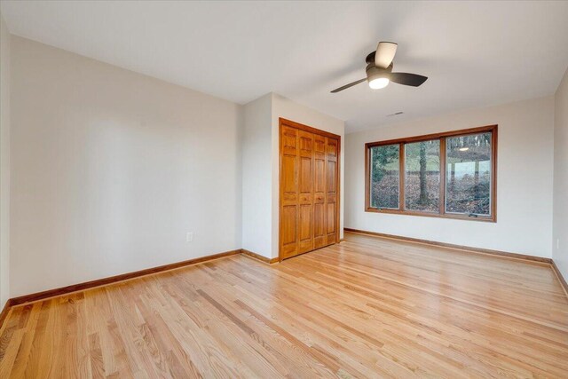 3615 Dogwood Ln SW, Roanoke, VA 24015 - spare room featuring light wood-style floors, baseboards, and a ceiling fan