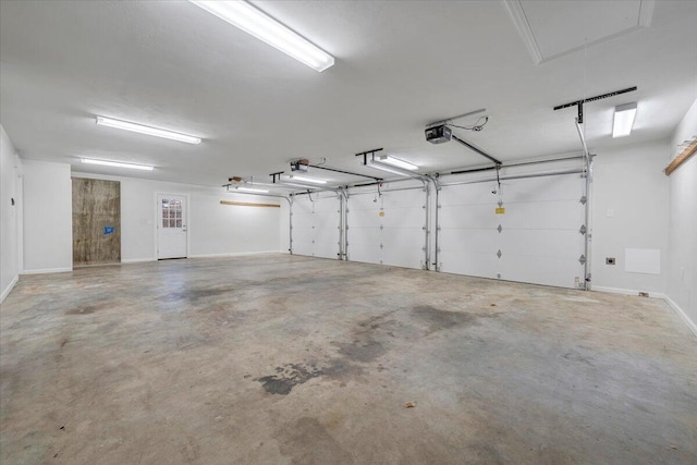3615 Dogwood Ln SW, Roanoke, VA 24015 - garage with a garage door opener and baseboards