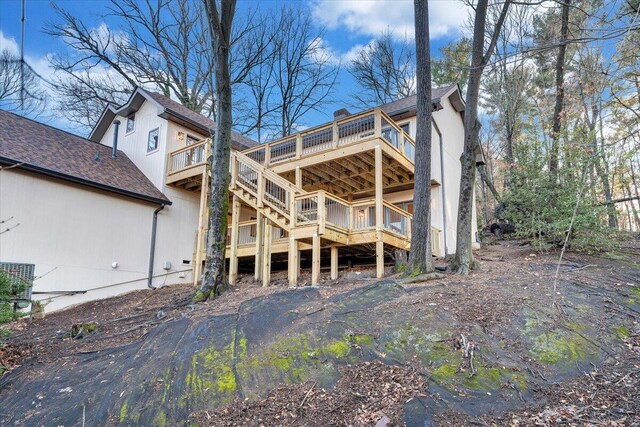 3615 Dogwood Ln SW, Roanoke, VA 24015 - back of property with a deck, a shingled roof, and stairs