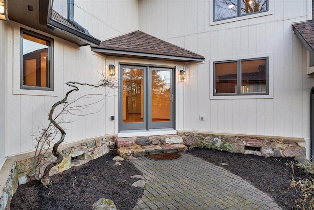 3615 Dogwood Ln SW, Roanoke, VA 24015 - doorway to property featuring a shingled roof, stone siding, and a patio area