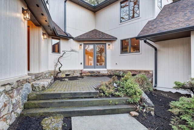3615 Dogwood Ln SW, Roanoke, VA 24015 - view of exterior entry with a shingled roof and stone siding