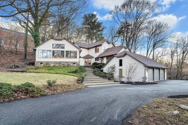 3615 Dogwood Ln SW, Roanoke, VA 24015 - view of front of home with stairway, a chimney, and driveway