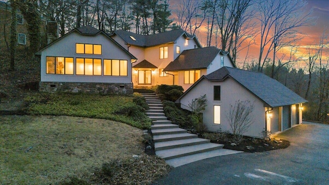 3615 Dogwood Ln SW, Roanoke, VA 24015 - view of front of property featuring stairs, driveway, stucco siding, and stone siding