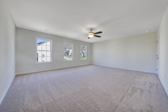 320 Woodside Dr, Salem, VA 24153 - spare room featuring light colored carpet, a ceiling fan, and plenty of natural light