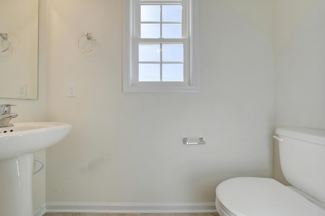 320 Woodside Dr, Salem, VA 24153 - bathroom with toilet, a sink, and baseboards