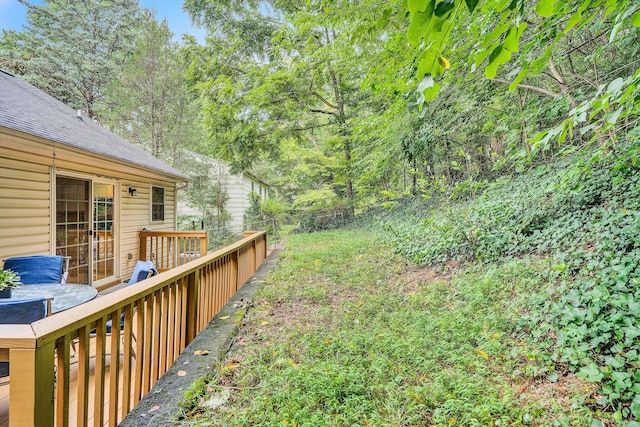 view of yard with a wooden deck