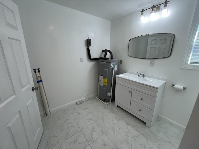 bathroom featuring water heater and vanity