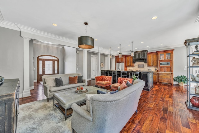 living area with recessed lighting, crown molding, baseboards, and dark wood-style flooring