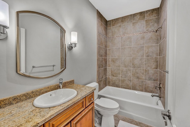 bathroom featuring vanity, toilet, shower / bathtub combination, and tile patterned flooring