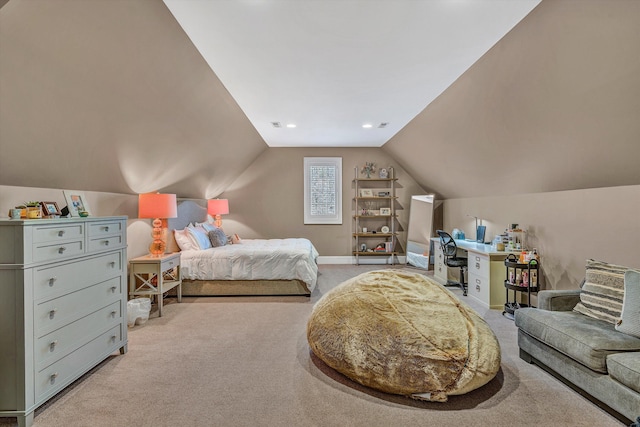 bedroom featuring lofted ceiling, baseboards, and light carpet