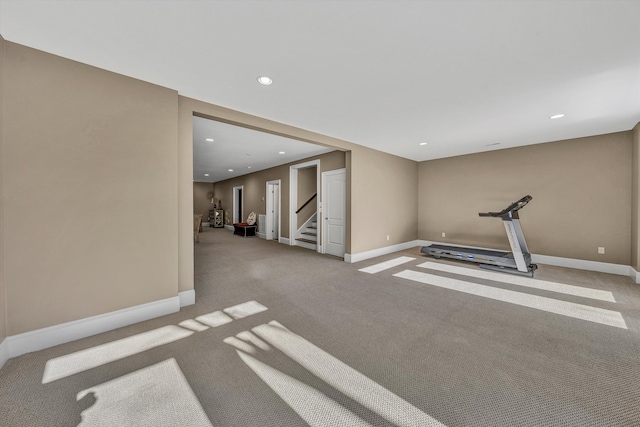 workout room featuring recessed lighting, baseboards, and carpet floors