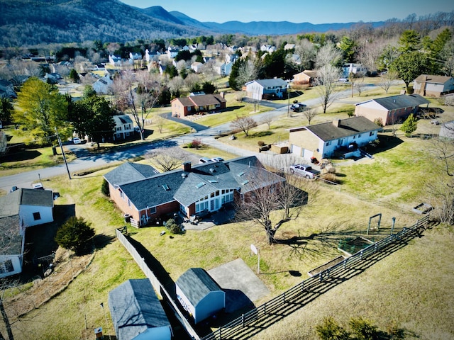 drone / aerial view featuring a mountain view and a residential view