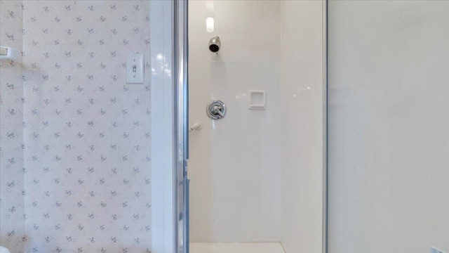 bathroom featuring a stall shower