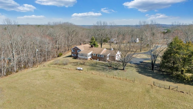 birds eye view of property with a rural view