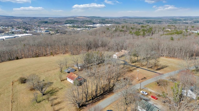 birds eye view of property with a mountain view and a rural view