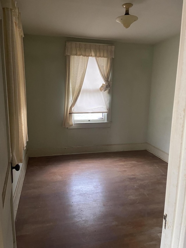 1345 Stone Mill Rd, Hurt, VA 24563 - unfurnished room featuring wood finished floors and baseboards