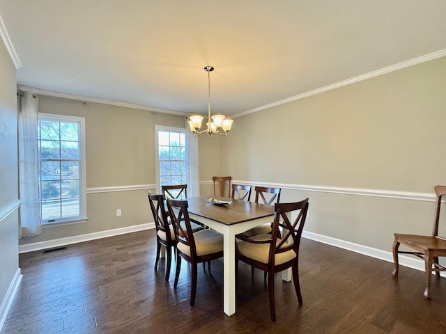 dining area featuring baseboards, visible vents, and dark wood-type flooring