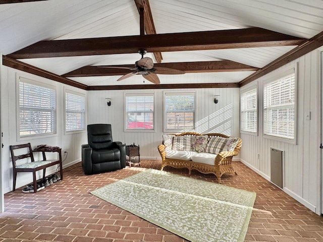 interior space with brick floor, plenty of natural light, and lofted ceiling with beams