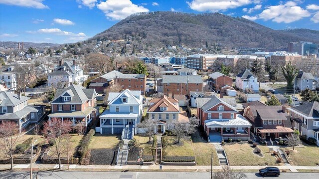 aerial view featuring a residential view and a mountain view