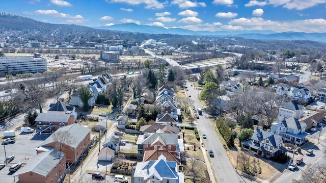 drone / aerial view featuring a mountain view